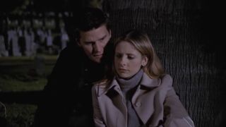 Angel and Buffy talking at the cemetary after Joyce's funeral