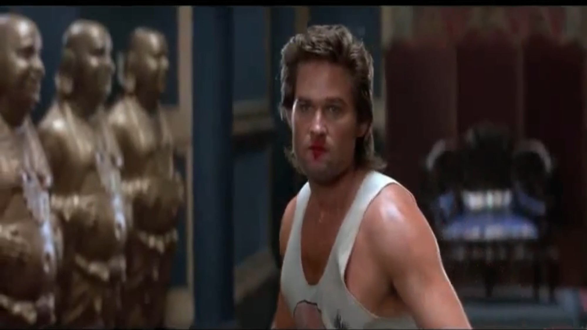 Kurt Russell with lipstick on his face in Big Trouble in Little China