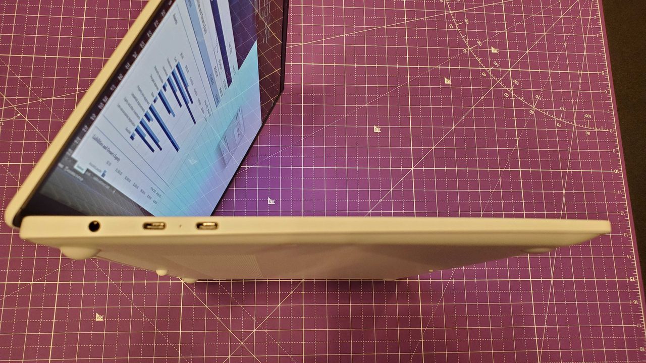 white laptop sitting on desk