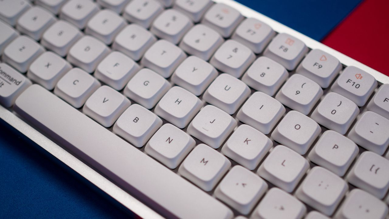 Showcasing shallowness of the keys of Lofree Flow keyboard