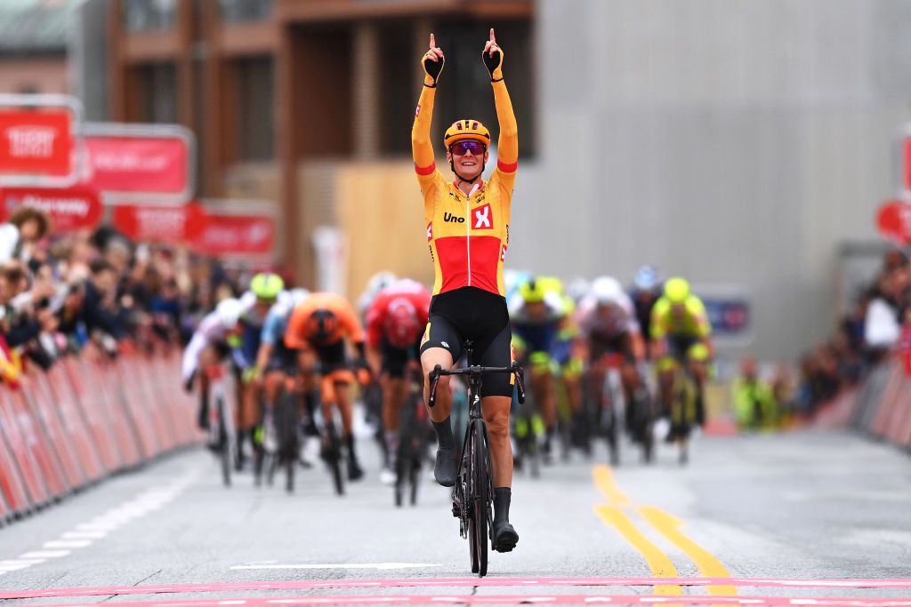 TROMSO NORWAY AUGUST 05 Markus Hoelgaard of Norway and UNO X Pro Cycling Team celebrates at finish line as stage winner during the 8th Arctic Race Of Norway 2021 Stage 1 a 1425km stage from Troms to Troms ArcticRace on August 05 2021 in Tromso Norway Photo by Stuart FranklinGetty Images