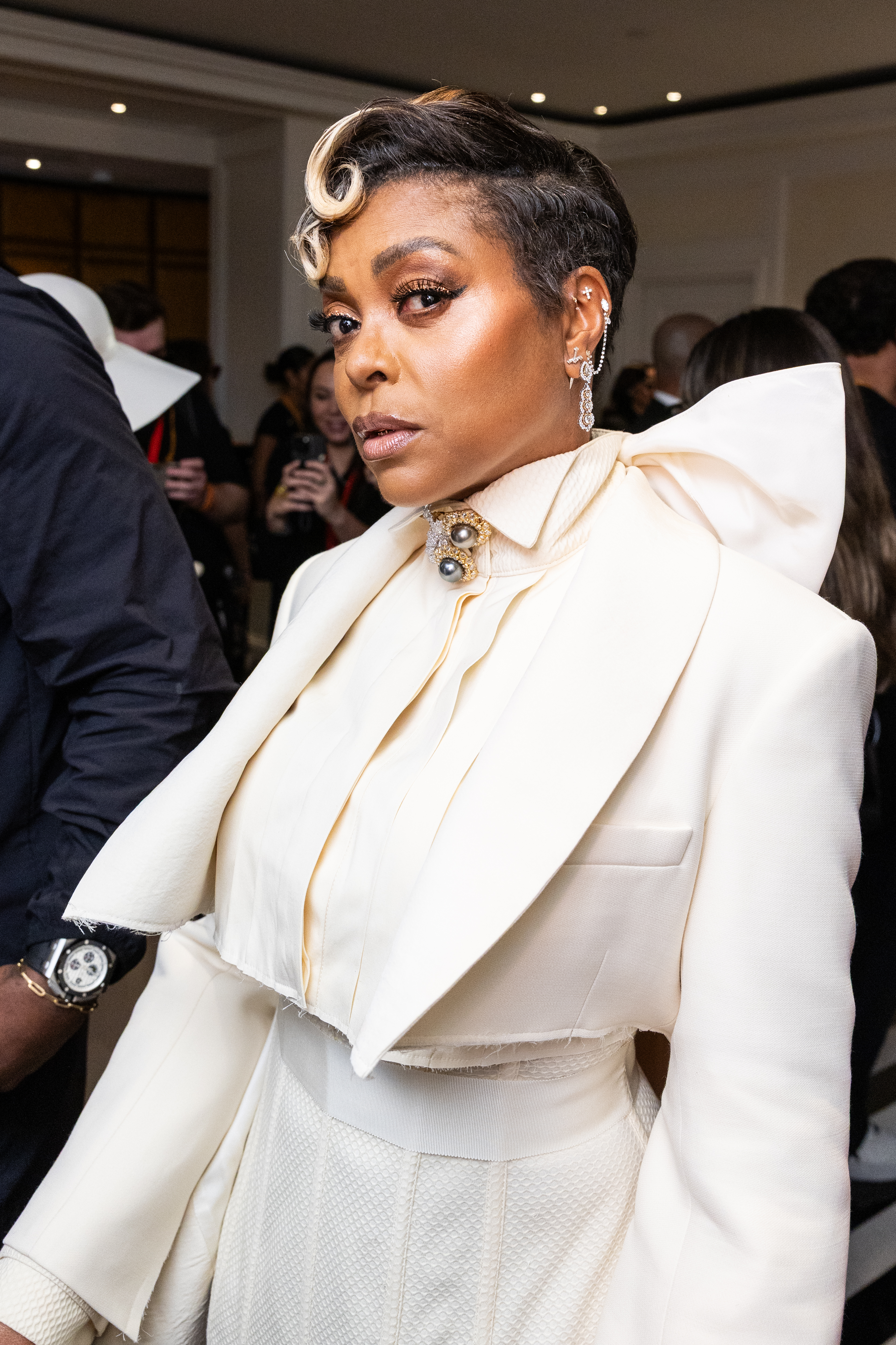 Taraji P. Henson in a cropped kiss curl hairstyle.