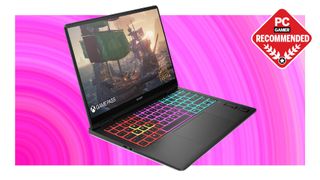 A HP Omen Transcend 14 gaming laptop on a pink background with a PC Gamer Recommended logo on top