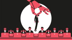 Concept image showing a robotic hand picking up a human worker, signifying AI-related job losses.