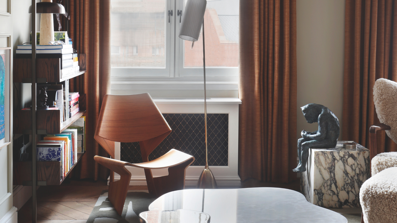 Wooden occasional armchair in a modern sitting room