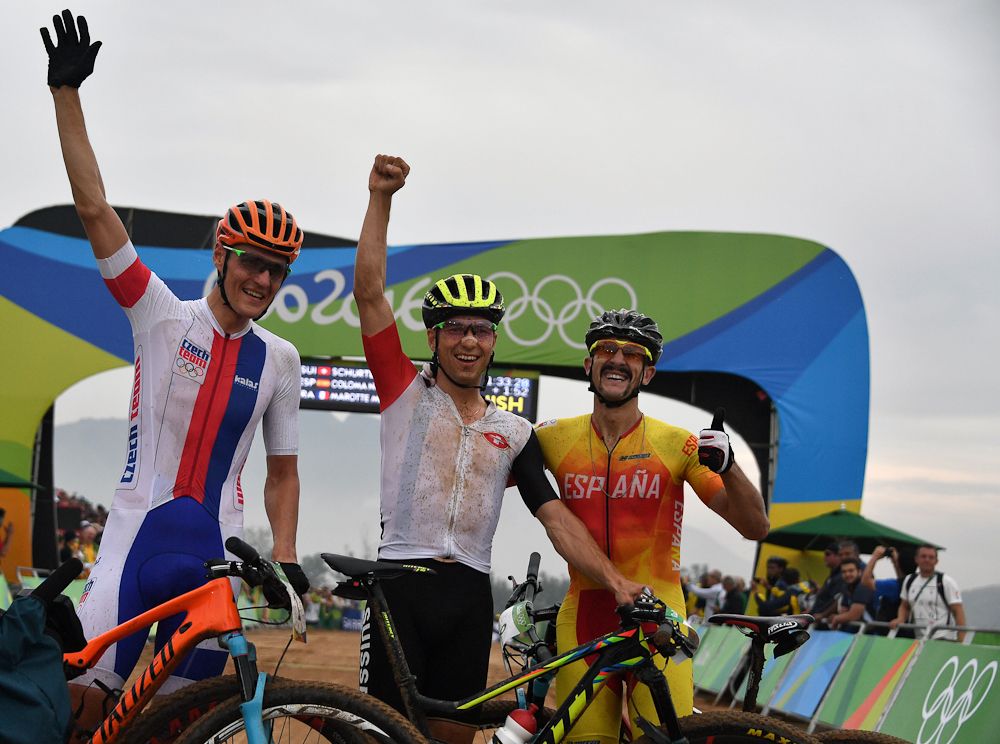 Second placed Czech Republic's Jaroslav Kulhavy, winner Switzerland's Nino Schurter and third placed Spain's Carlos Coloma