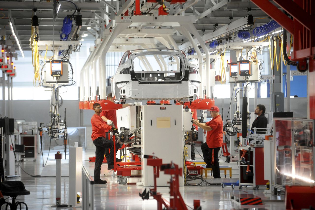 Workers at the Telsa factory in Fremont, California.