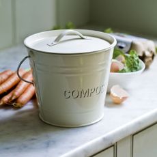 ktichen with ceramic countertop and compost bin