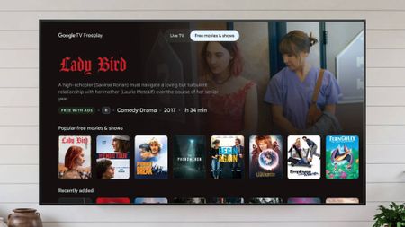 A Google TV showing the Freeplay interface with a catalog of on-demand movies and shows 