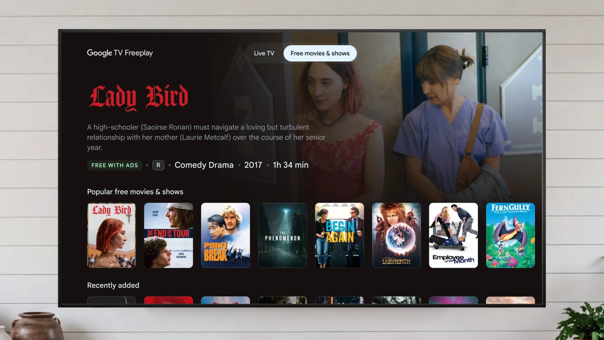 A Google TV showing the Freeplay interface with a catalog of on-demand movies and shows 