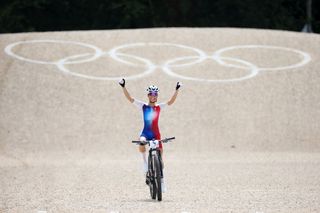 ELANCOURT FRANCE JULY 28 Pauline Ferrand Prevot of Team France celebrates at finish line as race winner during the Womens CrossCountry Cycling Mountain Bike Gold Medal race on day two of the Olympic Games Paris 2024 at Elancourt Hill on July 28 2024 in Elancourt France Photo by Jared C TiltonGetty Images