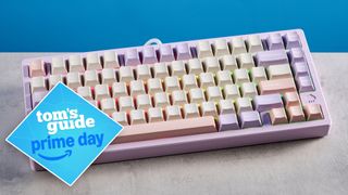 The Wobkey Rainy75 keyboard on a stone surface with a blue background and a Tom's Guide Prime Day badge on the lower left of the image.