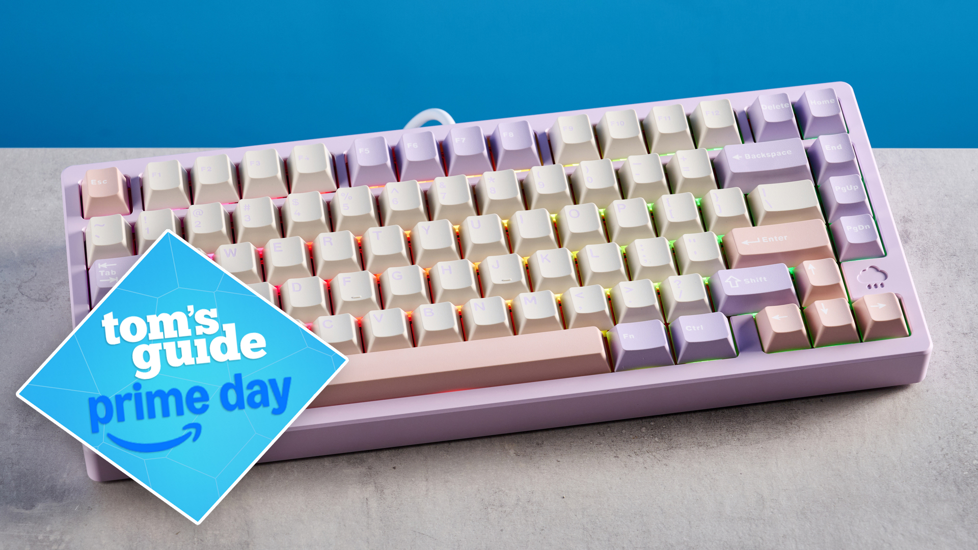 The Wobkey Rainy75 keyboard on a stone surface with a blue background and a Tom&#039;s Guide Prime Day badge on the lower left of the image.
