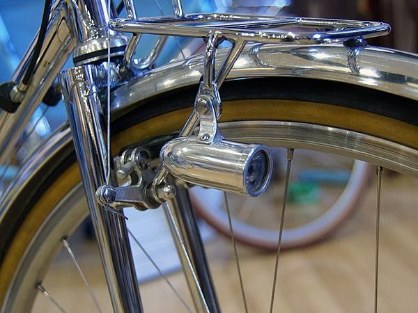 The classic-looking front and rear light housings actually contain fully modern (and bright) LED emitters.