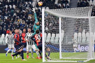 Juan Cuadrado scores directly from a corner for Juventus against Genoa in December 2021.