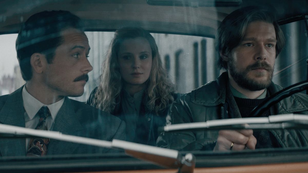 Taron Egerton, Sofia Lebedeva and Nikita Efremov in Tetris