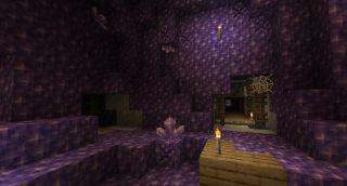 Minecraft amethyst - an amethyst geode underground intersecting with an abandoned mineshaft