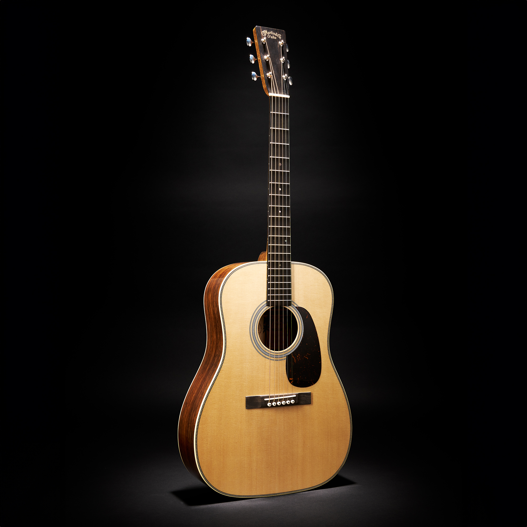 A photo of the Martin O’ahu HG-28 acoustic guitar