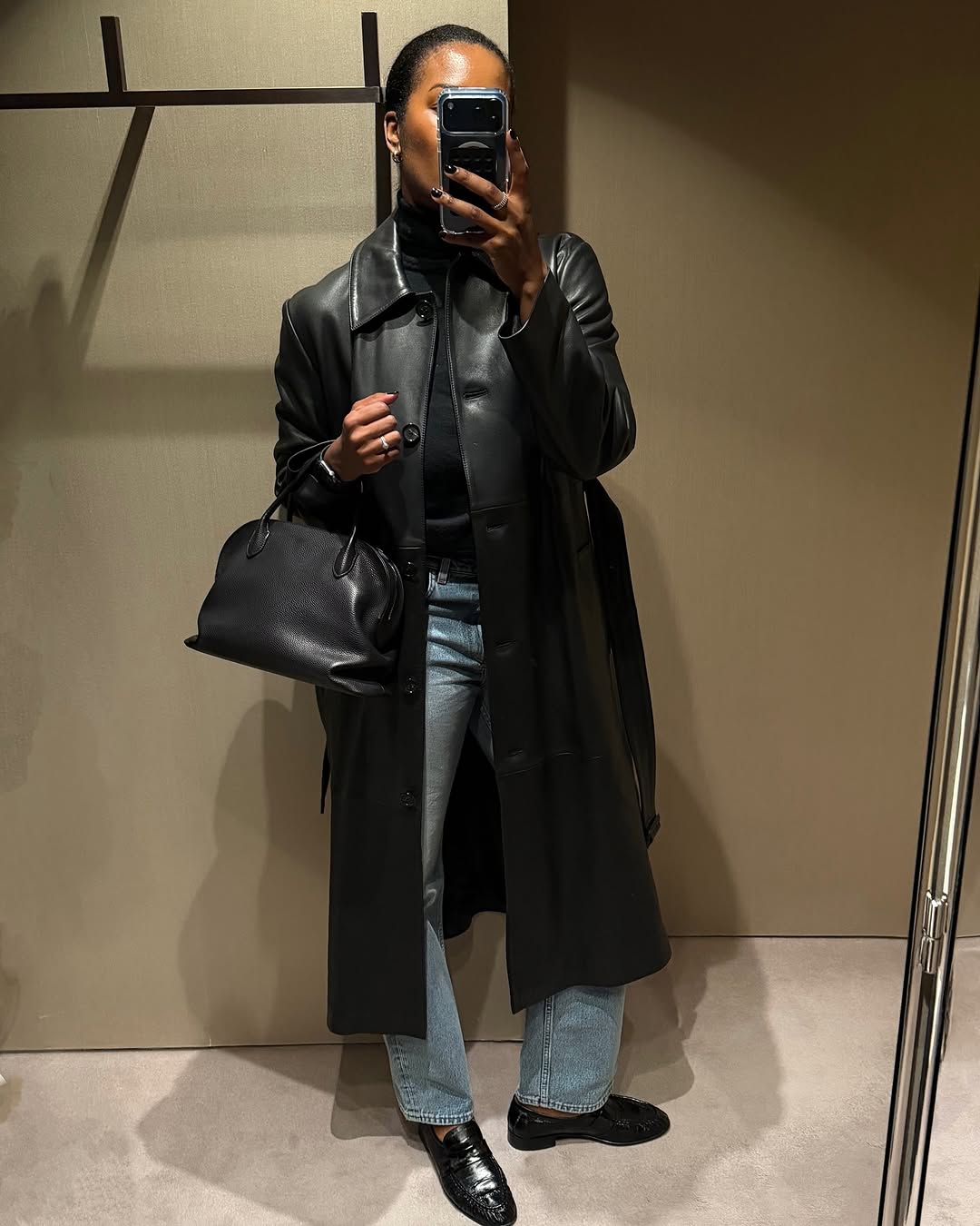 woman wearing winter to spring transitional jacket trends 2026