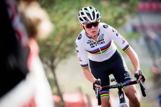 Fem van Empel wearing a rainbow jersey