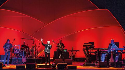 ARW (Jon Anderson, Trevor Rabin & Rick Wakeman) live on stage against red backdrop