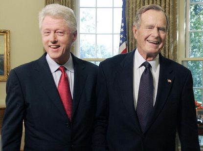 Former Presidents Bill Clinton and George H.W. Bush.
