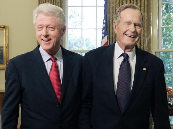 Former Presidents Bill Clinton and George H.W. Bush.