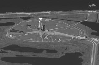 A satellite spotted the SpaceX Falcon 9 rocket carrying the first test flight of the Crew Dragon horizontal at the launch pad on Feb. 28, 2019.