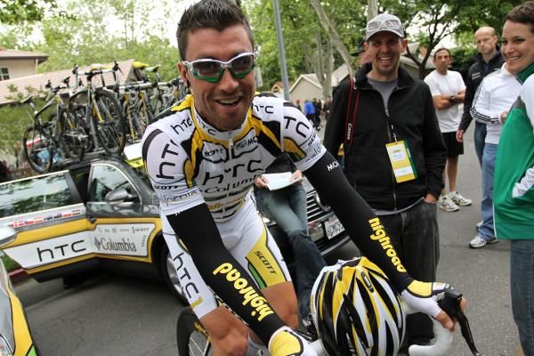 Bernhard Eisel rolls out to start after being greeted by fans.
