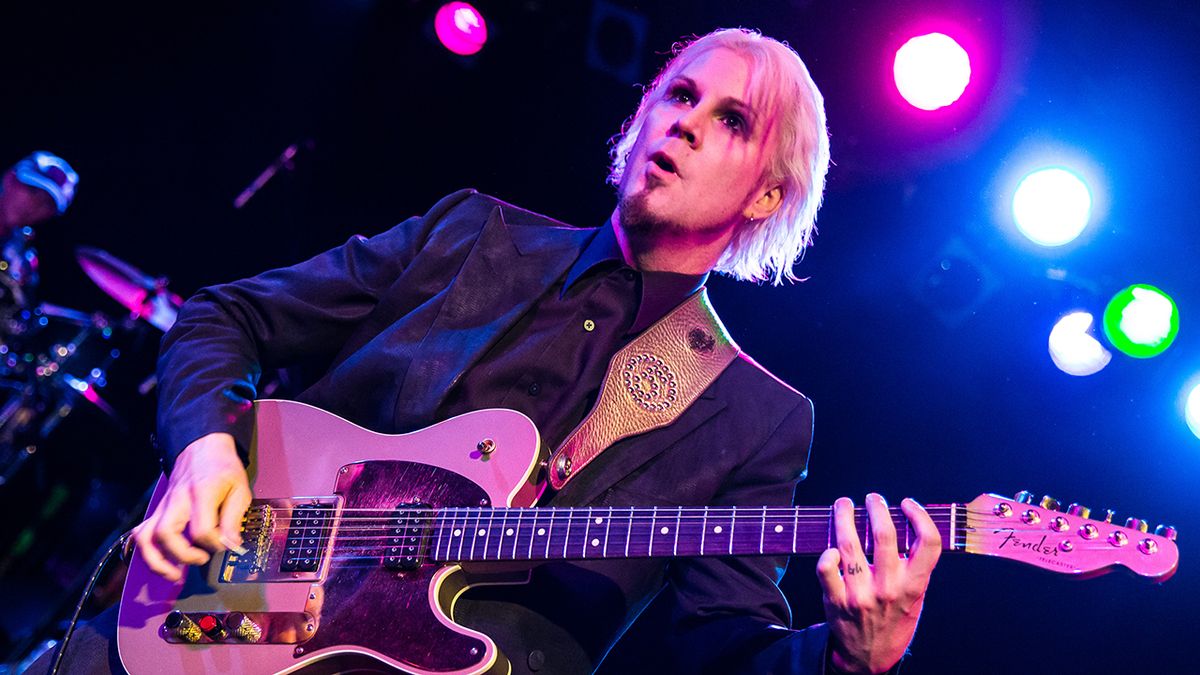 a shot of John 5 on stage