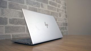 A photograph of the rear of the HP Envy 13 on a table