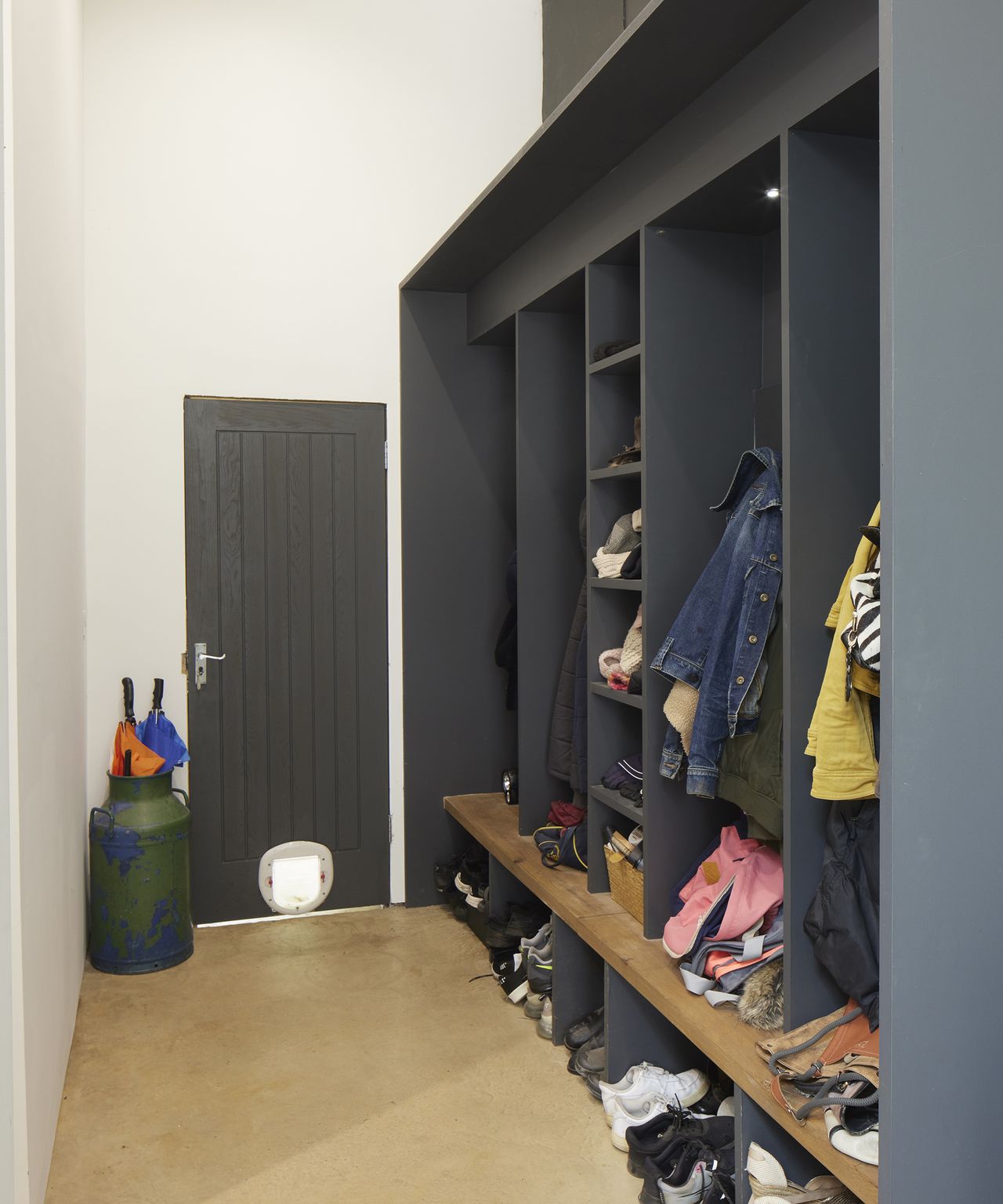 cloakroom with built in coat and shoe storage