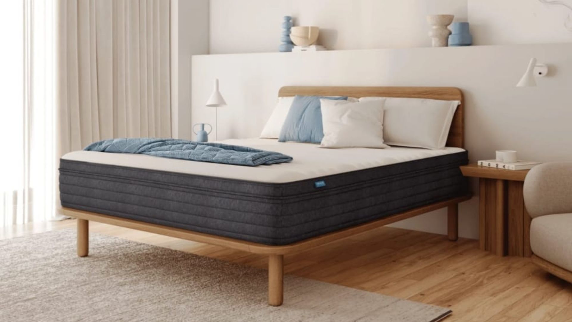 Origin Hybrid Mattress on a bed in a styled bedroom