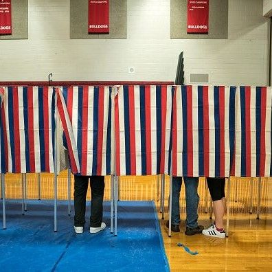 Screened off voting area.