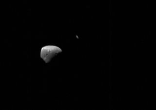 This image of the Mars moon Deimos and Saturn was taken by the European Space Agency's Mars Express orbiter on Jan. 15, 2018.