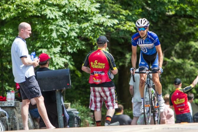Chris Jones (UnitedHealthcare) hits the feed zone at the top of the climb.