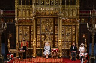 Queen Elizabeth II in the House of Lord's Chamber with Prince Charles, Prince of Wales and Camilla, Duchess of Cornwall