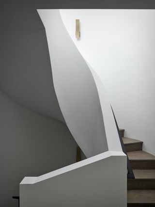 twisting staircase at Wraparound House by SAW
