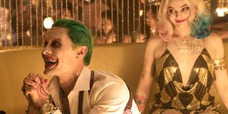 Joker begs with Harley behind him in Suicide Squad