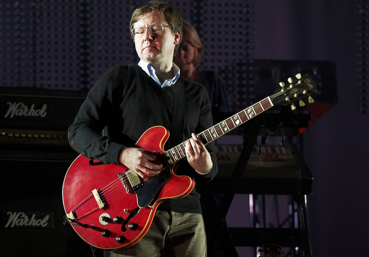 LEEDS, UNITED KINGDOM - AUGUST 28: Mark Webber of Pulp performs on stage during day three of Leeds Festival at Bramham Park on August 28, 2011 in Leeds, United Kingdom. (Photo by Gary Wolstenholme/Redferns)