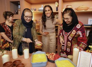 Meghan Markle cooks a holiday meal with a group of Afghan refugee women