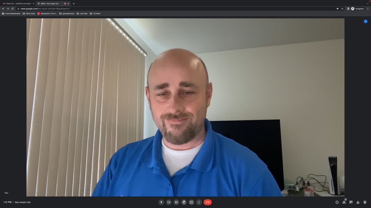 Apple Studio Display camera in Google Meet, blinds closed