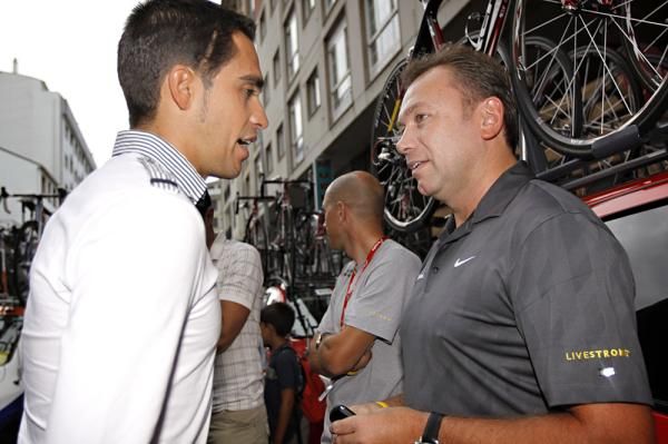 Alberto Contador greets his former team manager Johan Bruyneel