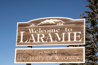 Welcome to Laramie sign- Home of the University of Wyoming