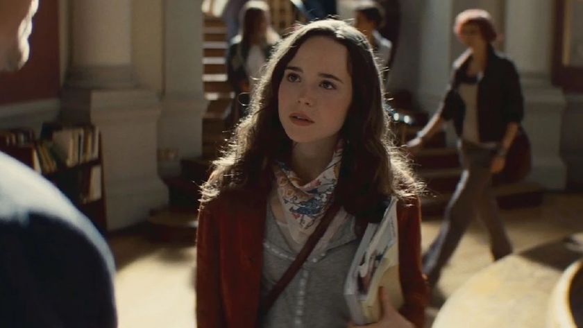 Elliot Page as Ariadne with long hair and a sweater on in Inception. 