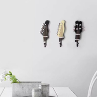 Guitar wall hangers by Shire Curios