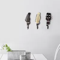 Guitar wall hangers by Shire Curios