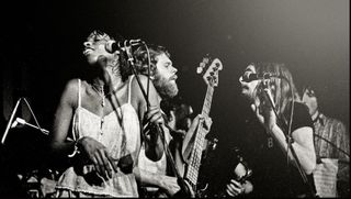 The Average White Band performing on stage at the Marquee Club, London, January 1975