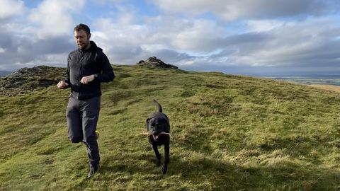 Nathan Stealth Jacket: Alex running with dog