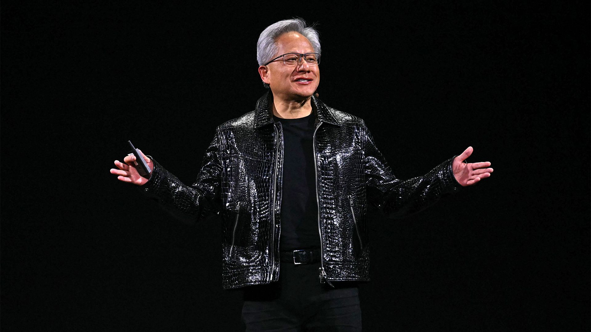 Jensen Huang says 'the AI race is on' as Nvidia shrugs off market ...